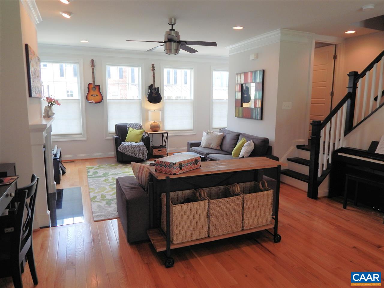 2055 Avinity Loop Charlottesville, VA 22902 - Photo 13 of 28 a living room with furniture and a wooden floor