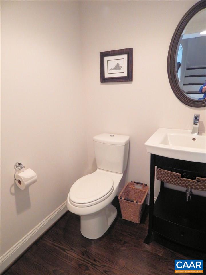2055 Avinity Loop Charlottesville, VA 22902 - Photo 16 of 28 a bathroom with a toilet a sink and mirror