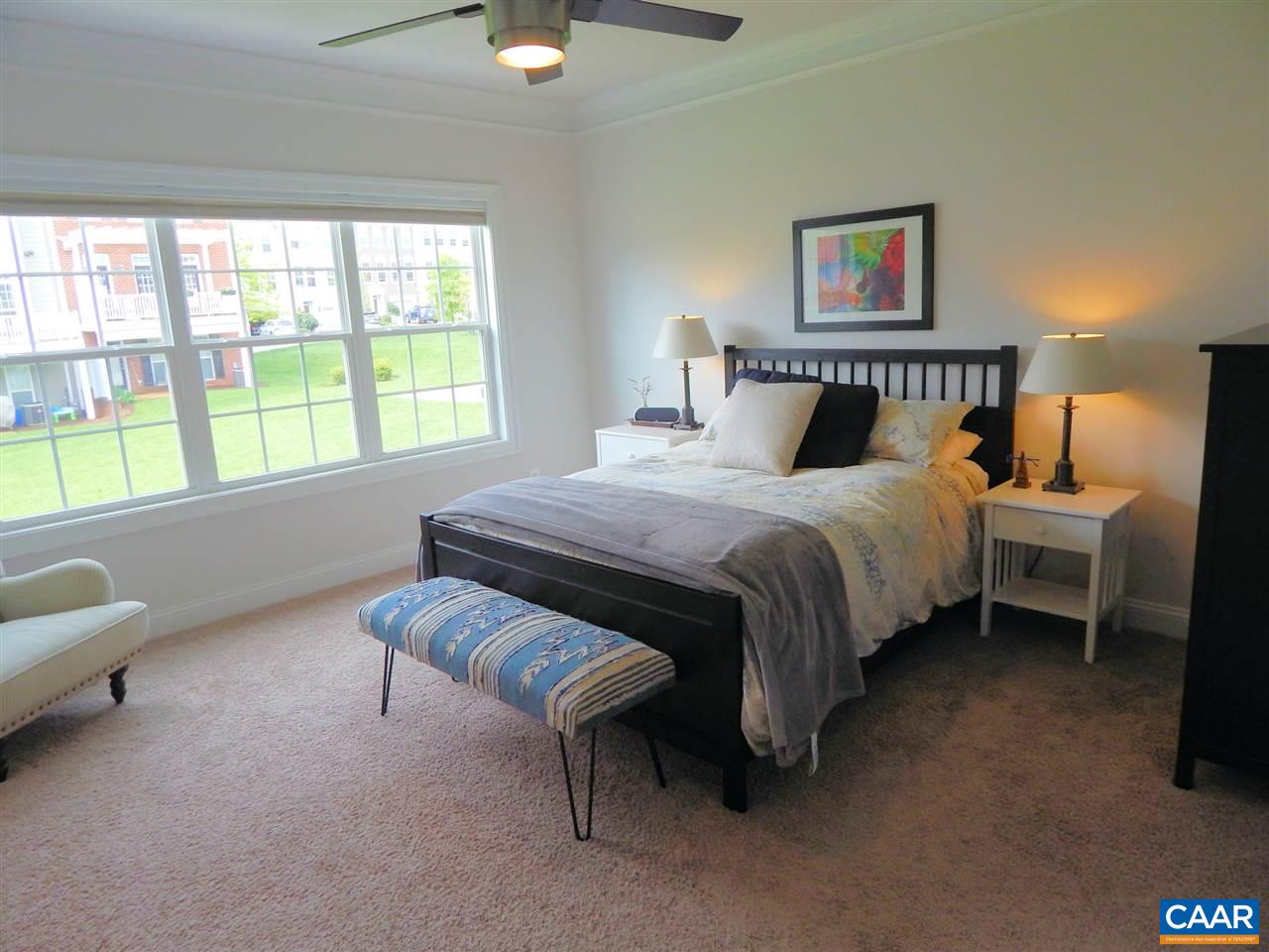 2055 Avinity Loop Charlottesville, VA 22902 - Photo 17 of 28 a bedroom with bed and a window