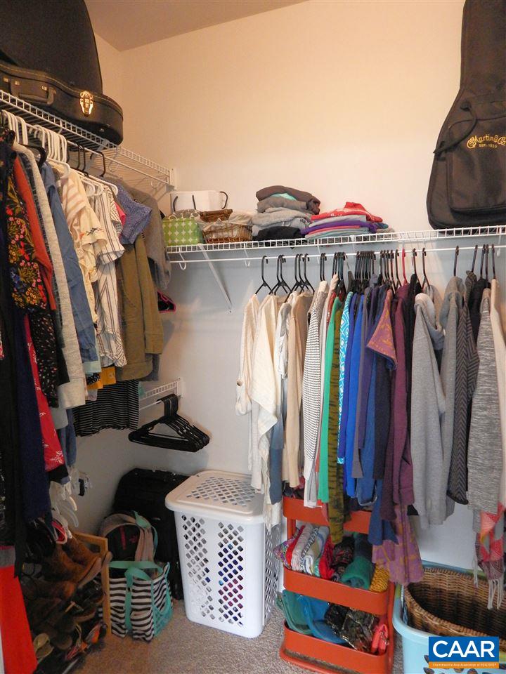 2055 Avinity Loop Charlottesville, VA 22902 - Photo 21 of 28 a view of walk in closet with clothes and shoes