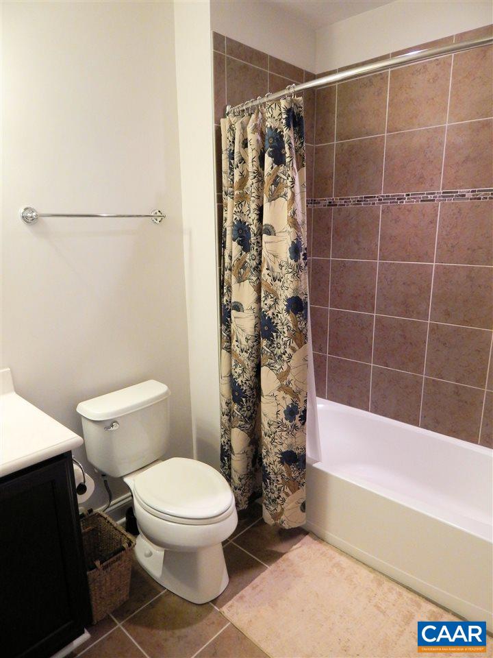 2055 Avinity Loop Charlottesville, VA 22902 - Photo 5 of 28 a bathroom with a toilet and a shower
