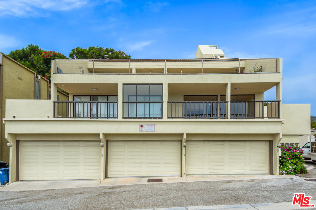 18057 Coastline Drive, Unit 5 Malibu, CA 90265 - Photo 20 of 20 a view of a building with a window