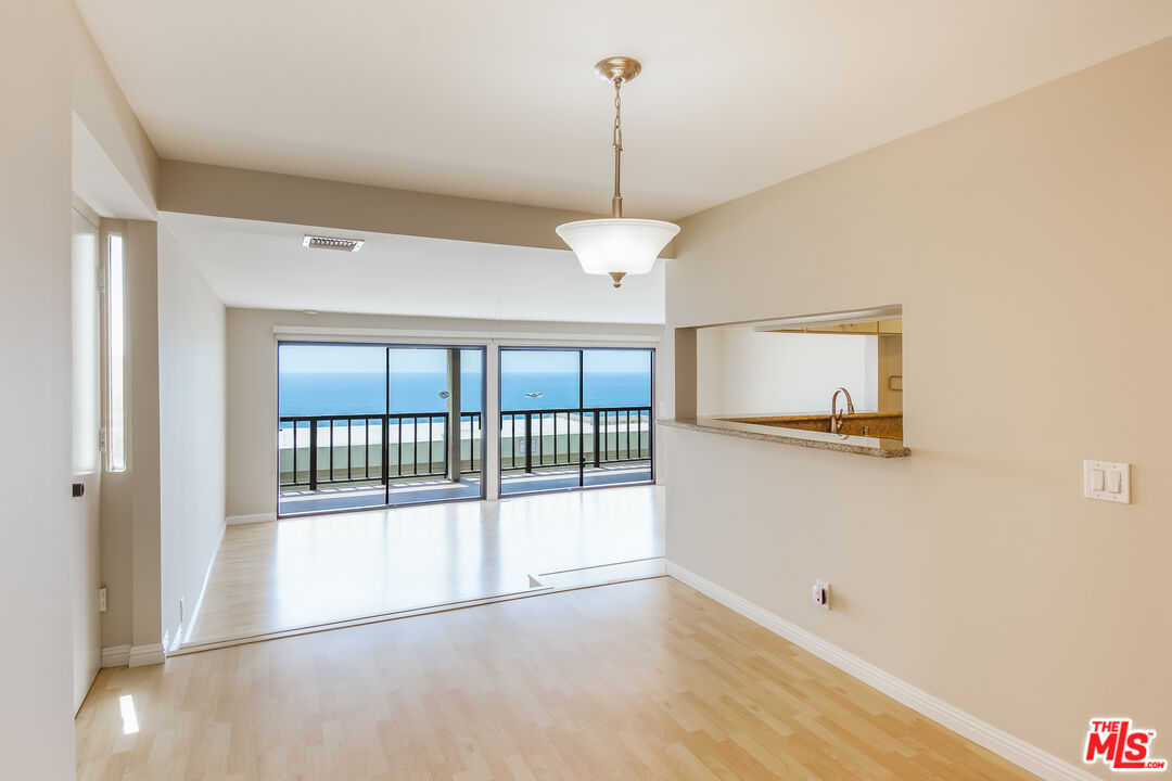 18057 Coastline Drive, Unit 5 Malibu, CA 90265 - Photo 7 of 20 a view of an empty room with a window