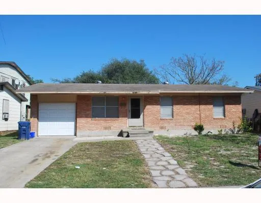 a house view with a garden space