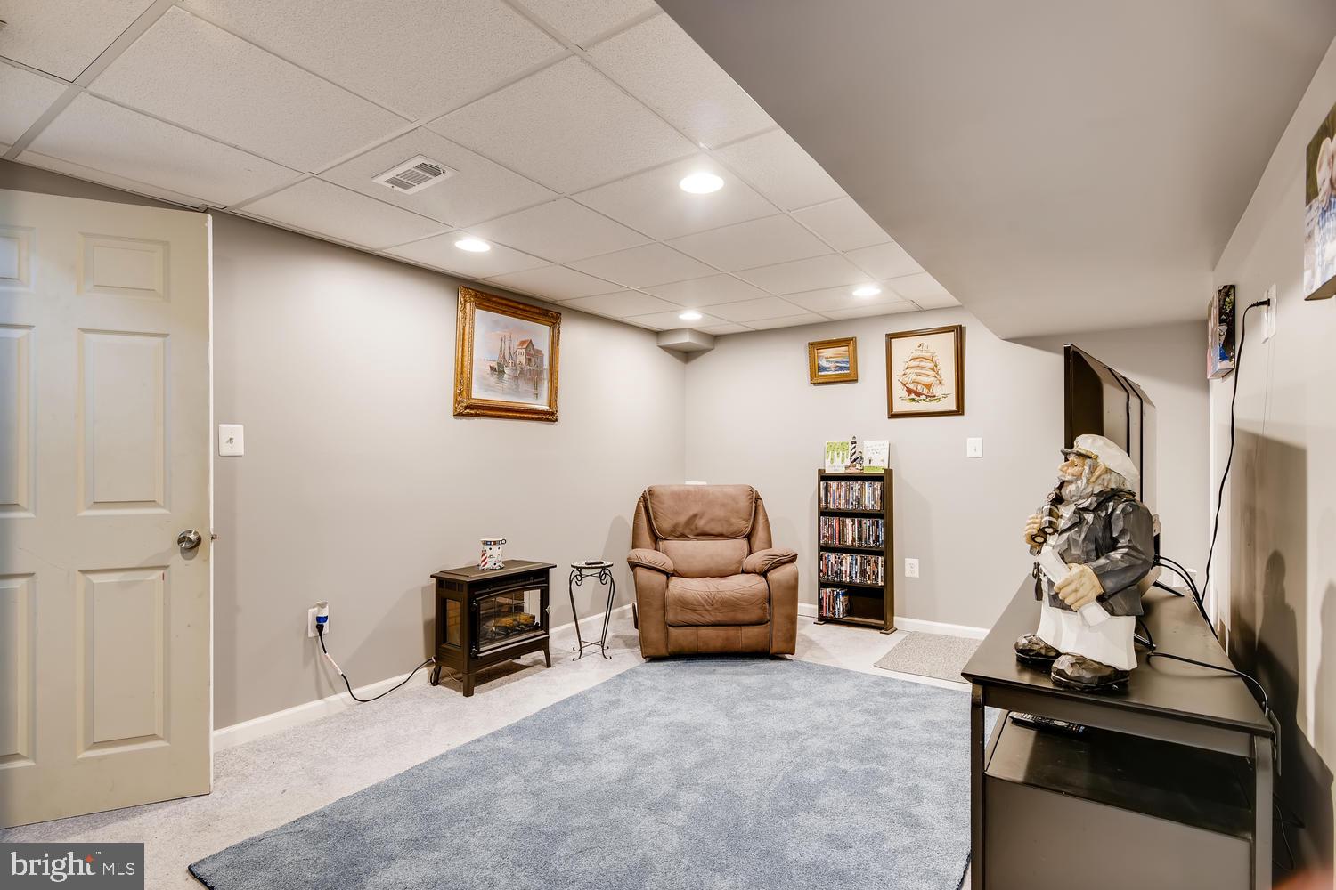 113 Compass Road Baltimore, MD 21220 - Photo 20 of 32 Lower level living room