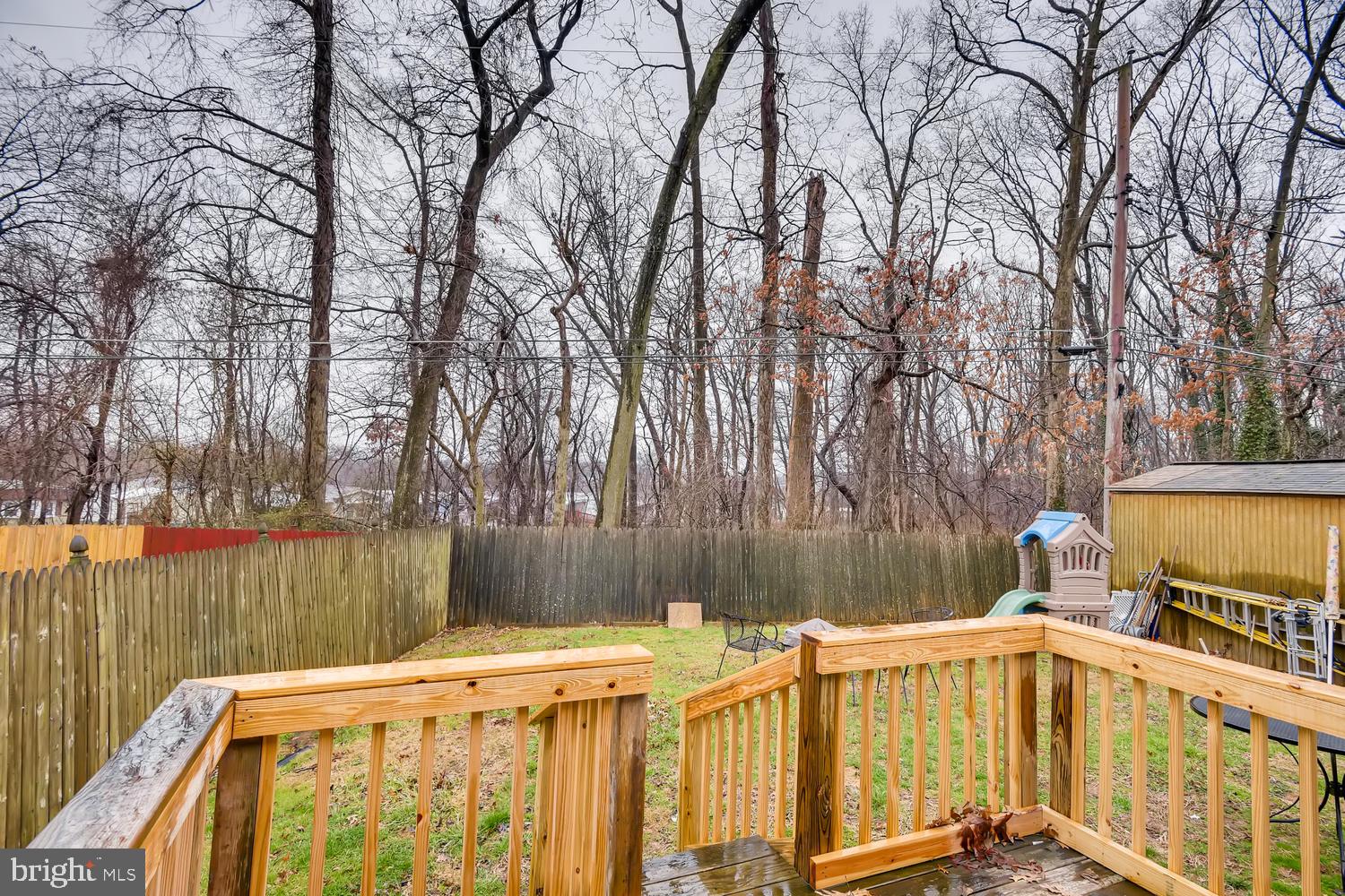 113 Compass Road Baltimore, MD 21220 - Photo 28 of 32 Privacy fenced yard with deck