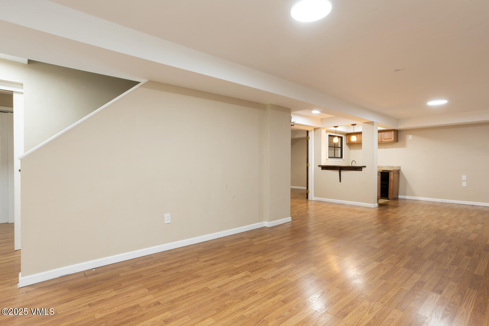 260 Longview Avenue Eagle, CO 81631 - Photo 13 of 34 a view of an empty room with wooden floor and a window