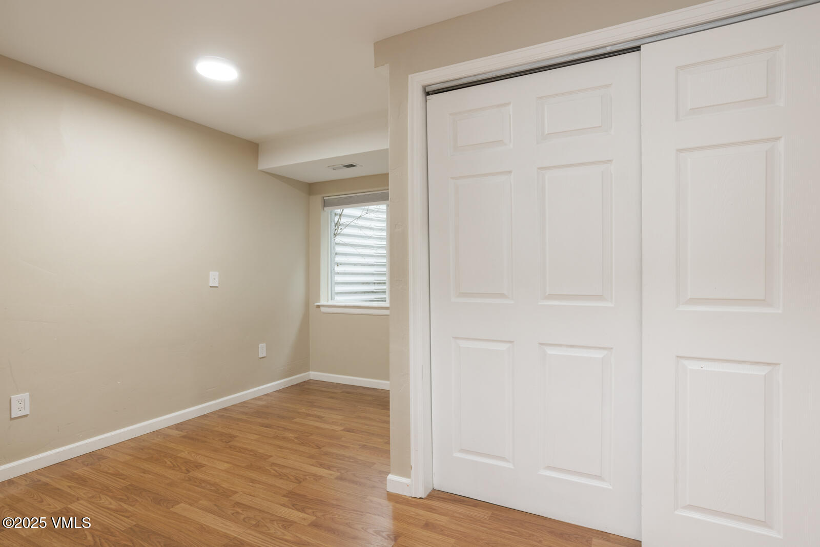 260 Longview Avenue Eagle, CO 81631 - Photo 14 of 34 an empty room with wooden floor and closet area