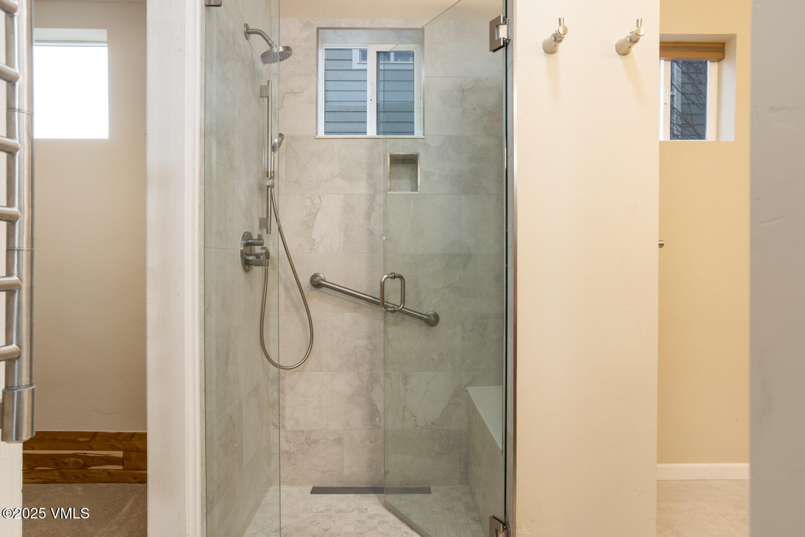 260 Longview Avenue Eagle, CO 81631 - Photo 20 of 34 a bathroom with a glass shower door
