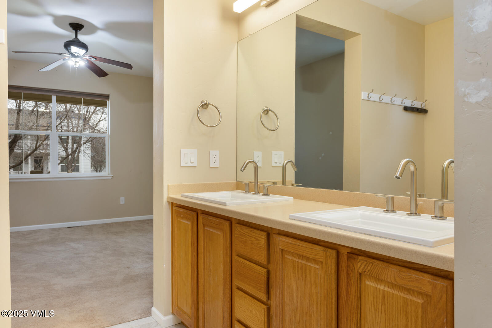 260 Longview Avenue Eagle, CO 81631 - Photo 21 of 34 a bathroom with a granite countertop sink a mirror and a