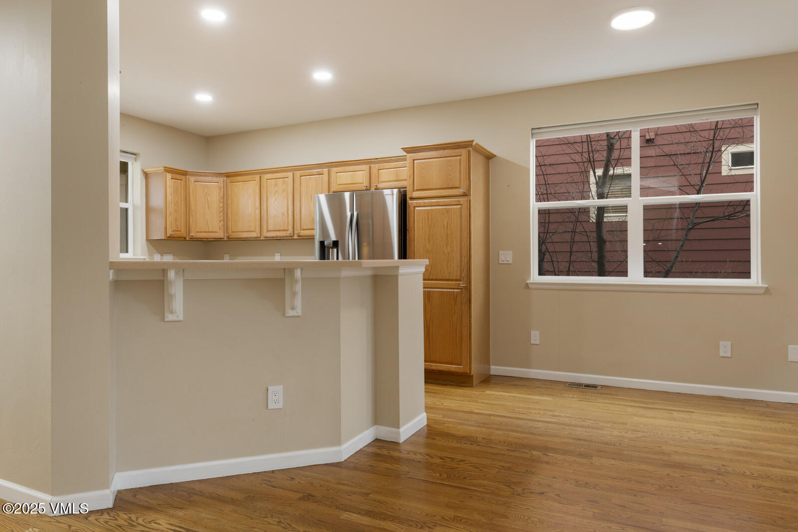 260 Longview Avenue Eagle, CO 81631 - Photo 7 of 34 a view of a kitchen with wooden floor and window