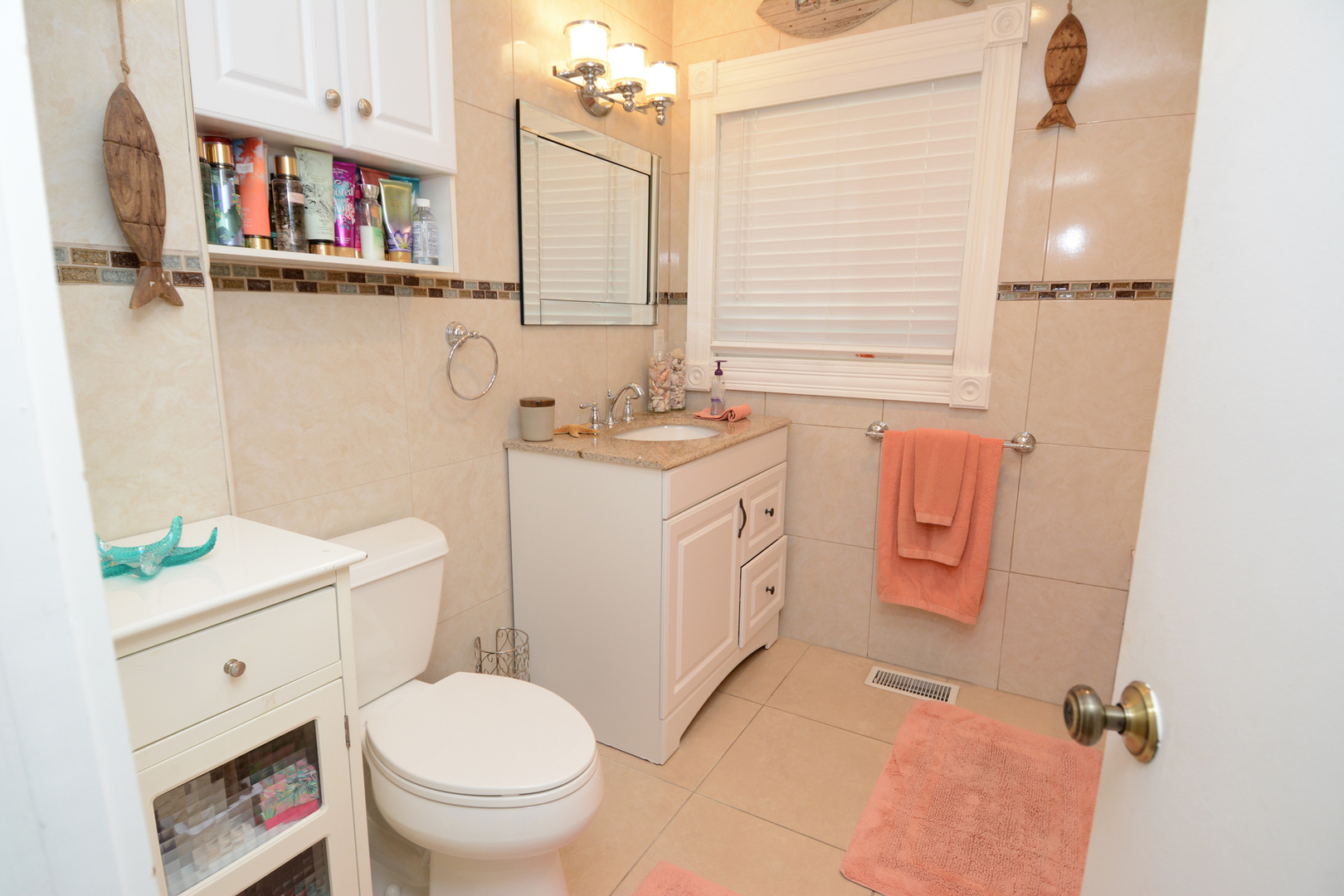 4N150 Thorntree Road St. Charles, IL 60174 - Photo 12 of 29 a bathroom with a sink toilet vanity and window