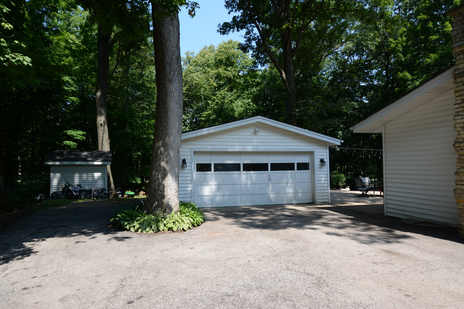 4N150 Thorntree Road St. Charles, IL 60174 - Photo 23 of 29 a front view of a house with a yard and garage