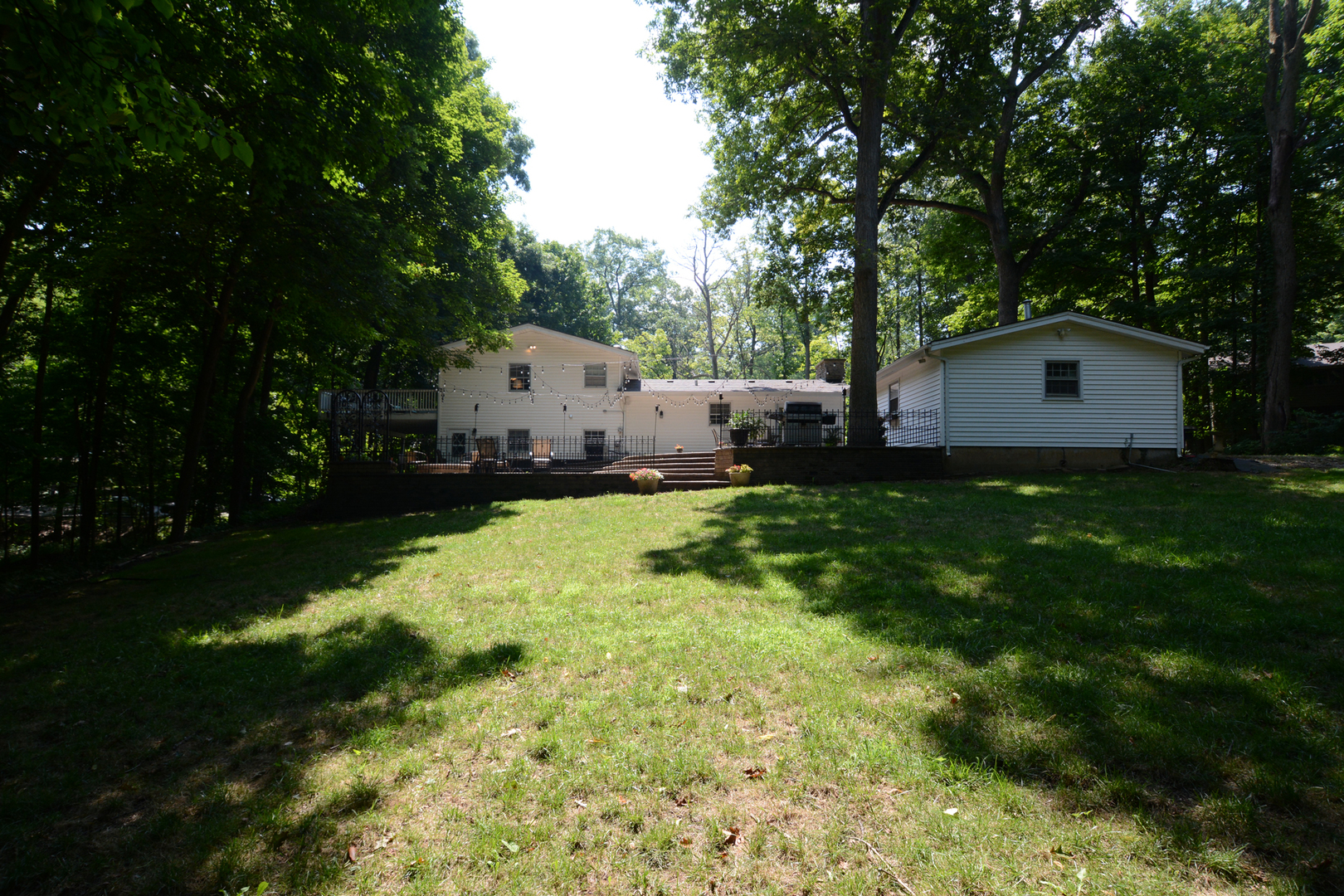 4N150 Thorntree Road St. Charles, IL 60174 - Photo 29 of 29 a house view with a garden space