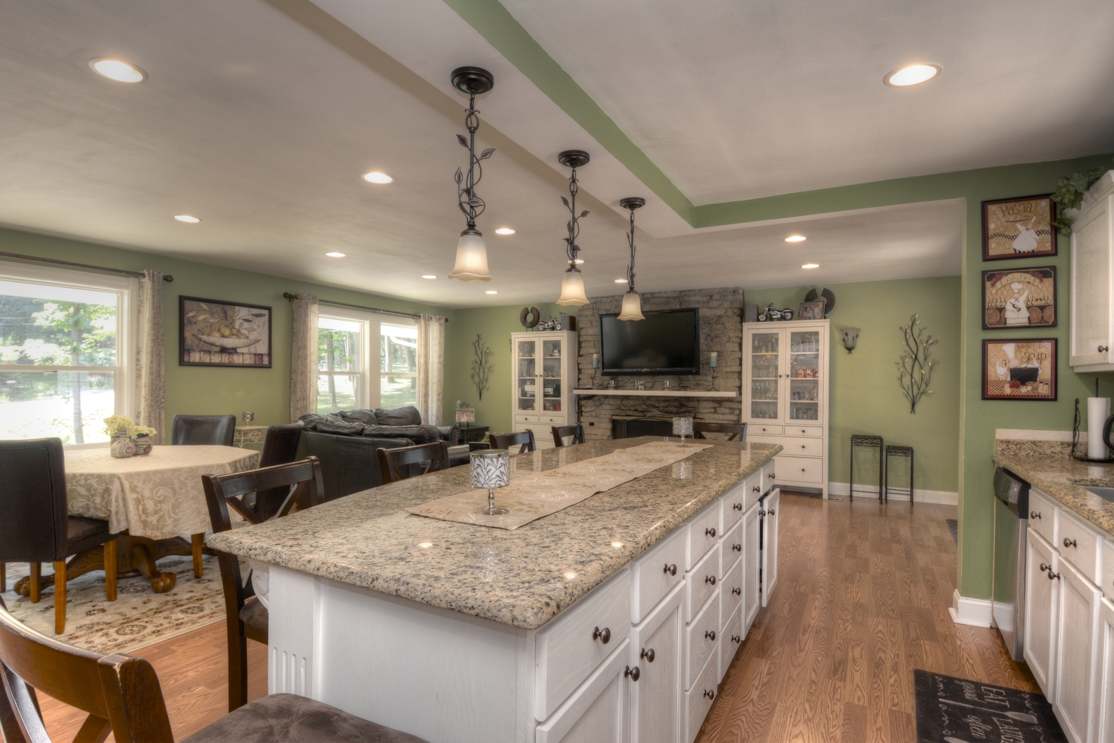 4N150 Thorntree Road St. Charles, IL 60174 - Photo 4 of 29 a dining hall with stainless steel appliances granite countertop a kitchen island a refrigerator and a sink
