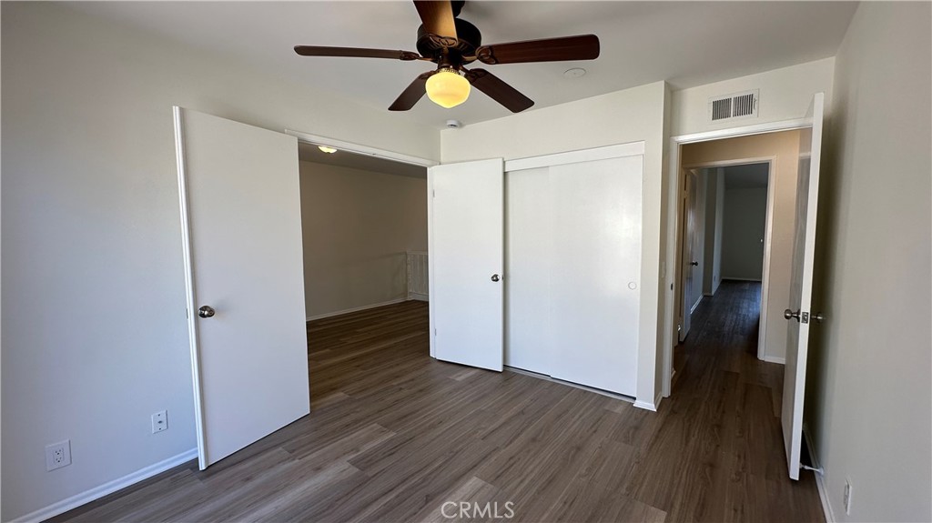 19519 Rinaldi Street, Unit 57 Porter Ranch, CA 91326 - Photo 17 of 28 a view of empty room with wooden floor