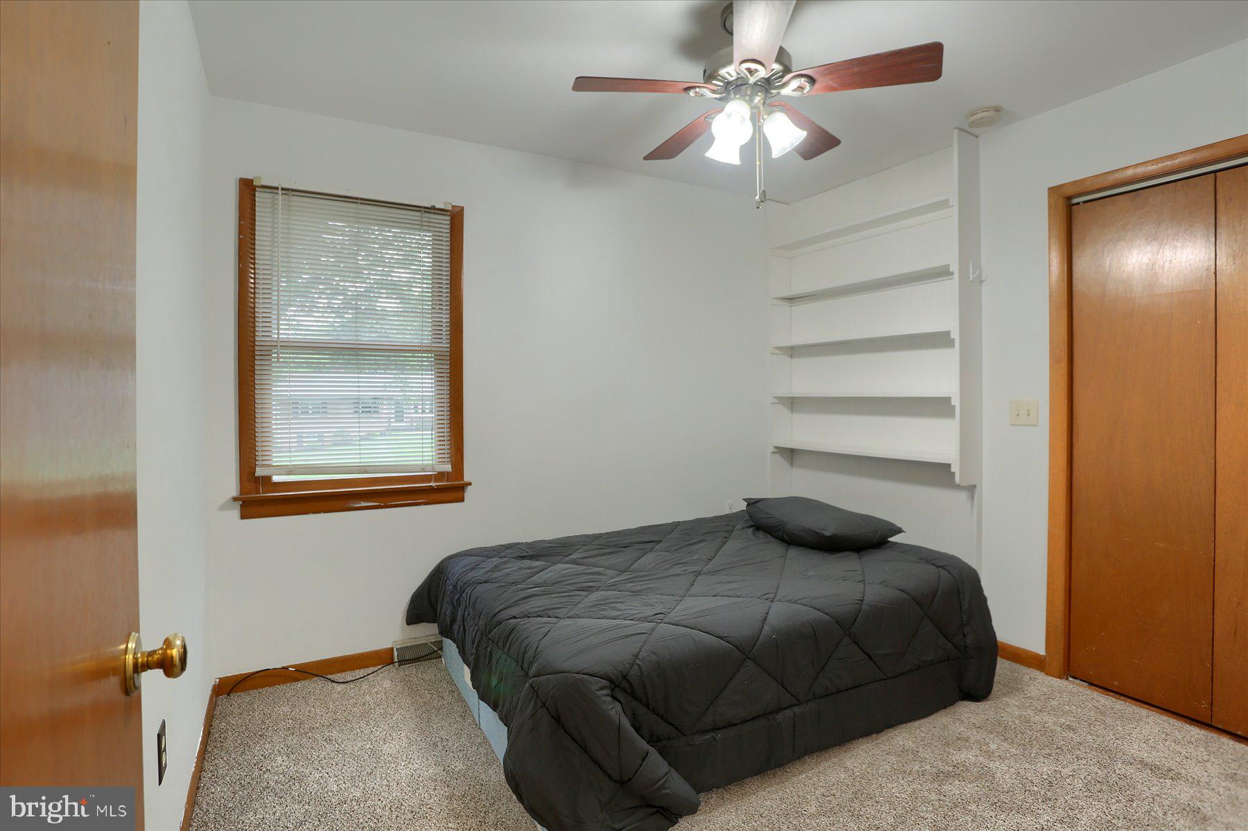 12 South Ridge Road Boiling Springs, PA 17007 - Photo 21 of 39 a bedroom with a bed and a chandelier