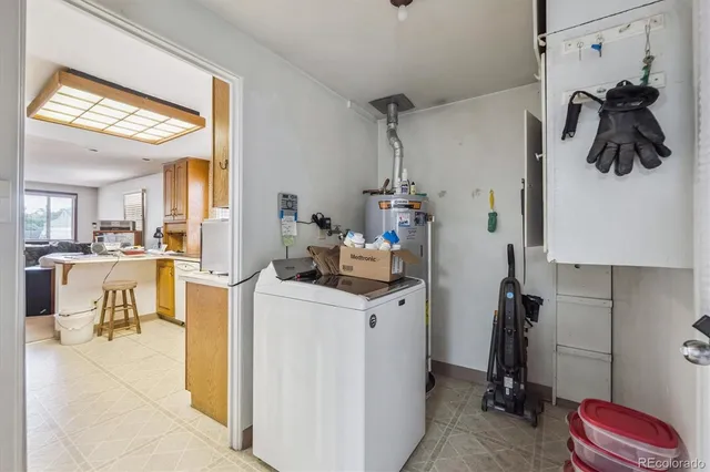 a room with gym equipment and a view of living room