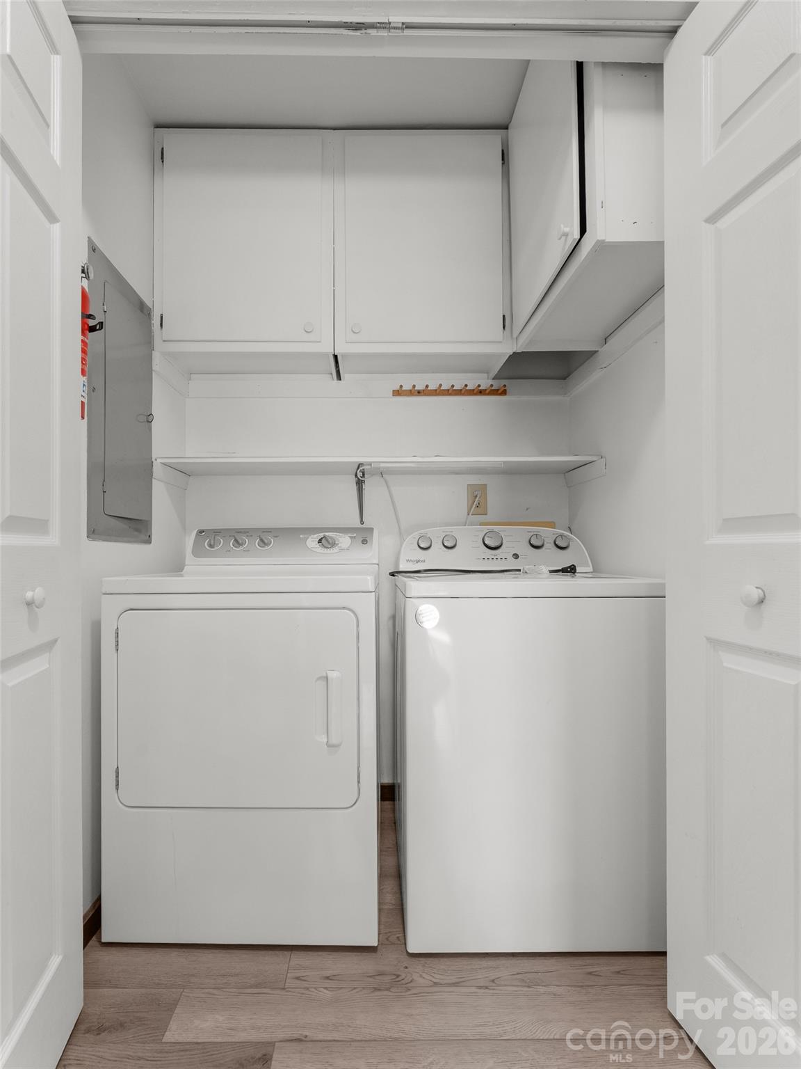 32 Honey Suckle Ridge Road Pisgah Forest, NC 28768 - Photo 24 of 35 a utility room with dryer and washer