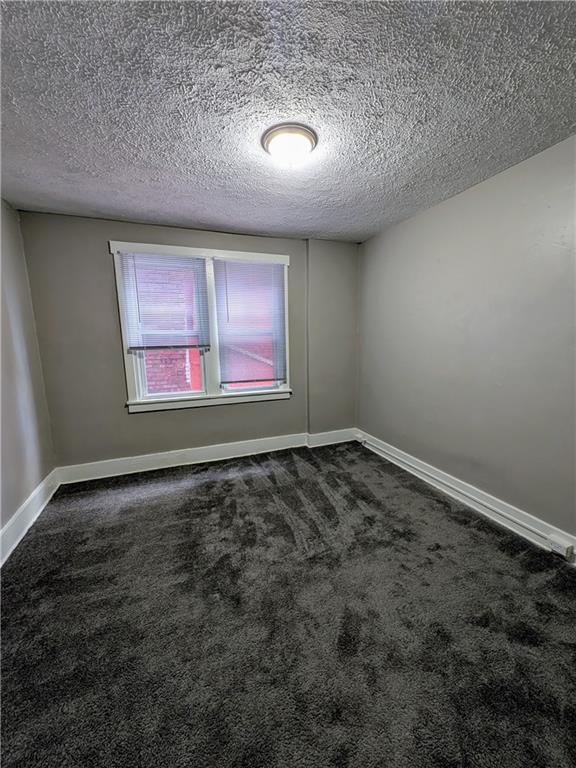 82 Harlem Avenue McKees Rocks, PA 15136 - Photo 12 of 27 an empty room with windows