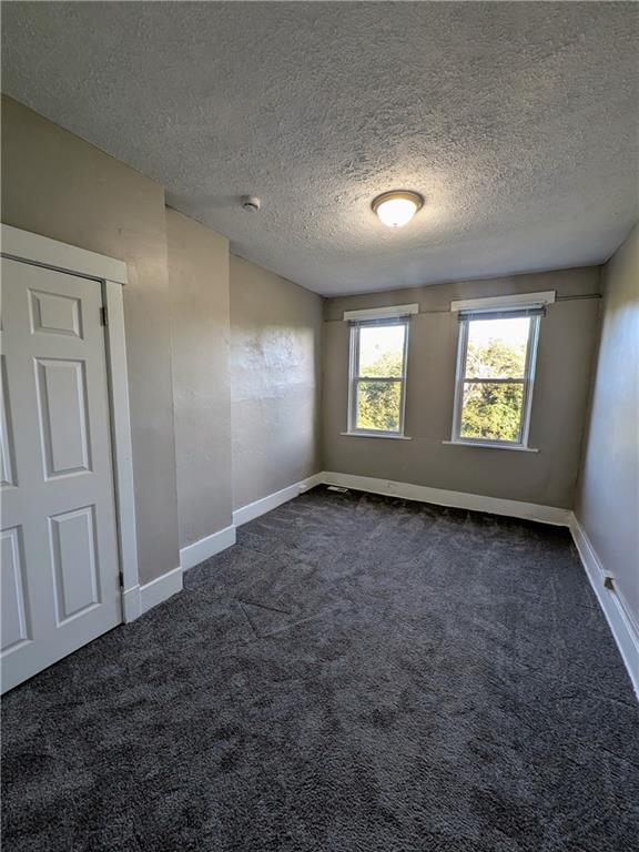 82 Harlem Avenue McKees Rocks, PA 15136 - Photo 13 of 27 an empty room with windows