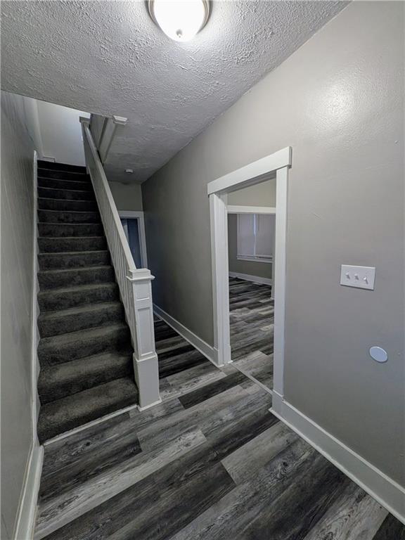 82 Harlem Avenue McKees Rocks, PA 15136 - Photo 4 of 27 a view of entryway and hall with wooden floor