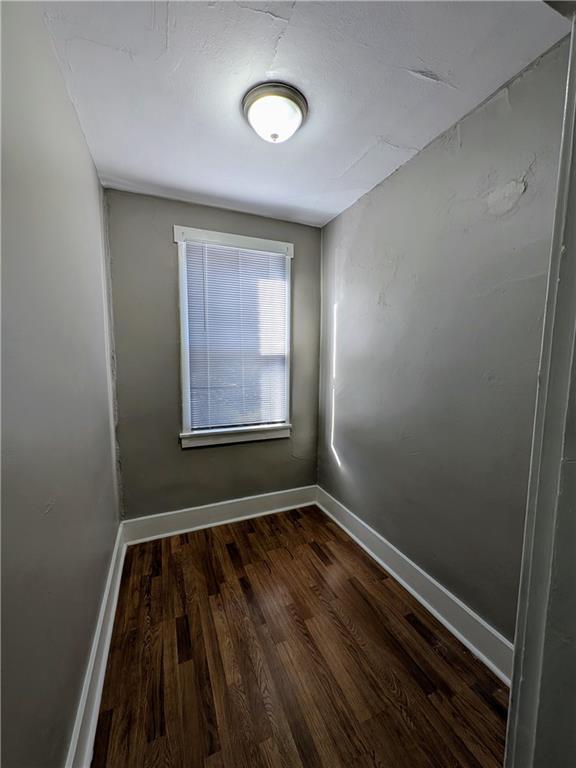 82 Harlem Avenue McKees Rocks, PA 15136 - Photo 10 of 27 a view of an empty room with wooden floor and a window