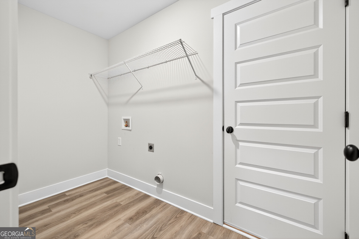 51 Brockton Way, Unit 2 Winder, GA 30680 - Photo 19 of 38 a view of an empty walk in closet