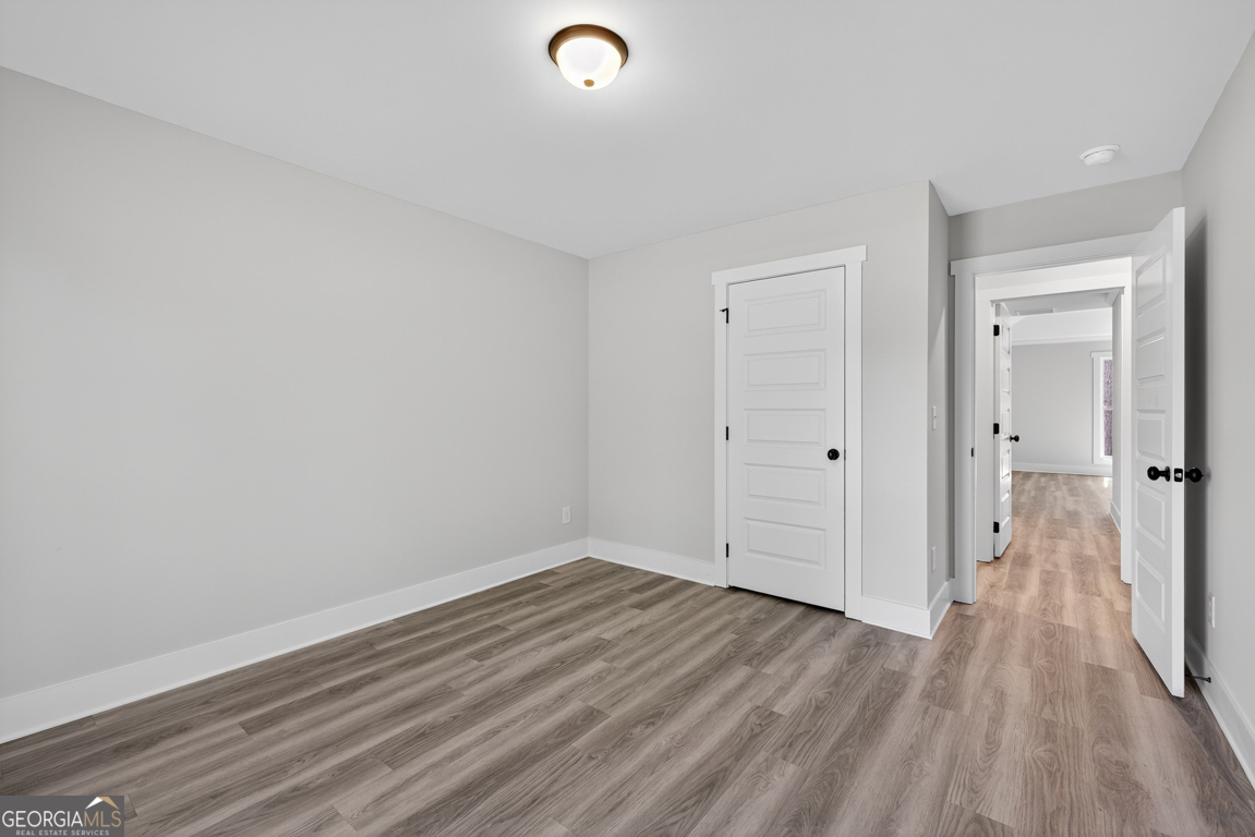 51 Brockton Way, Unit 2 Winder, GA 30680 - Photo 21 of 38 a view of a room with wooden floor