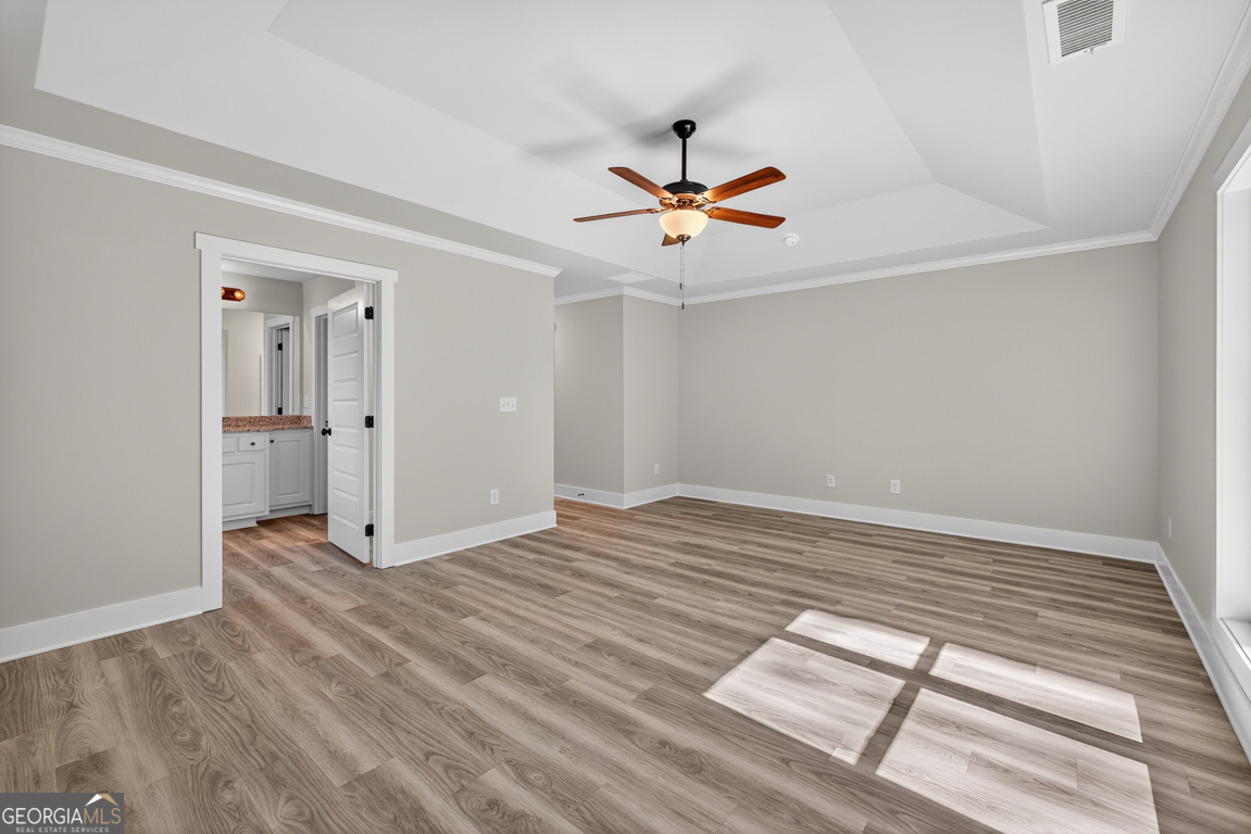 51 Brockton Way, Unit 2 Winder, GA 30680 - Photo 27 of 38 wooden floor in an empty room with a window