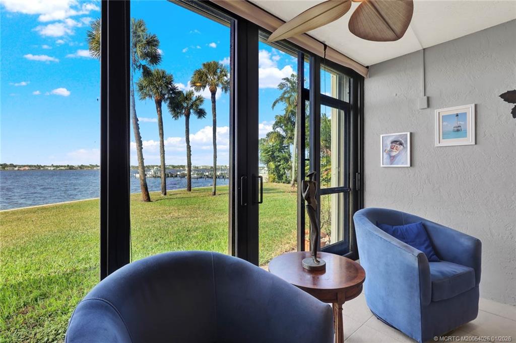 1950 Southwest Palm City Road, Unit 8106 Stuart, FL 34994 - Photo 20 of 54 a view of a porch with furniture and garden