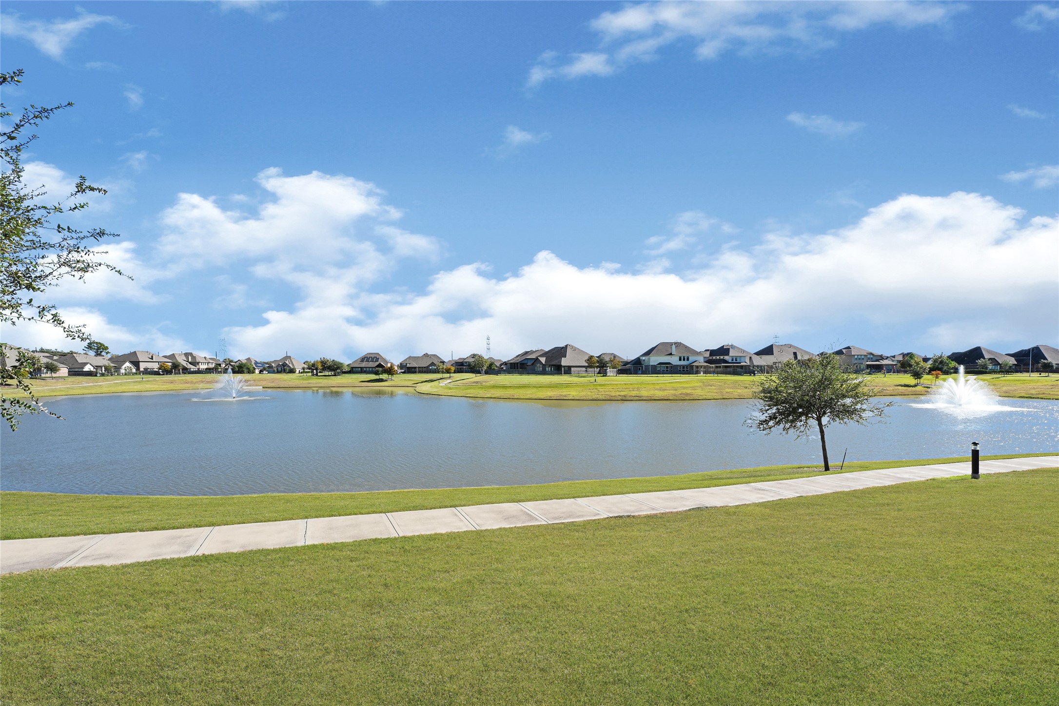 4307 Annandale Lane Rosharon, TX 77583 - Photo 28 of 31 The large pond featured here is enjoyed by the residents everyday and looks even more stunning from the backyard patio, the dining area and from the upstairs game room!