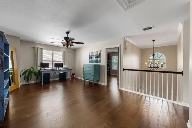 a view of livingroom with furniture wooden floor and window