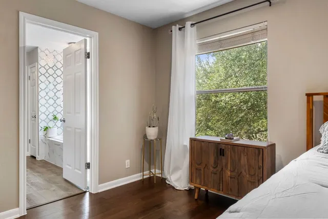 a view of a room with wooden floor and walls