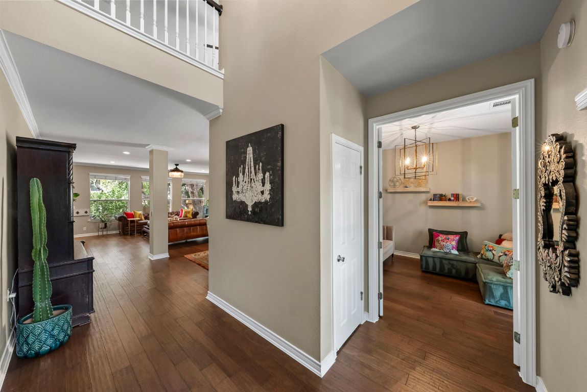 4104 Seldalia Trail Austin, TX 78732 - Photo 3 of 40 a view of a livingroom with furniture and hardwood floor