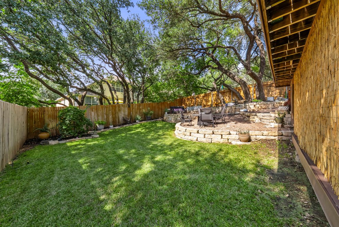 4104 Seldalia Trail Austin, TX 78732 - Photo 35 of 40 a view of a yard with large tree