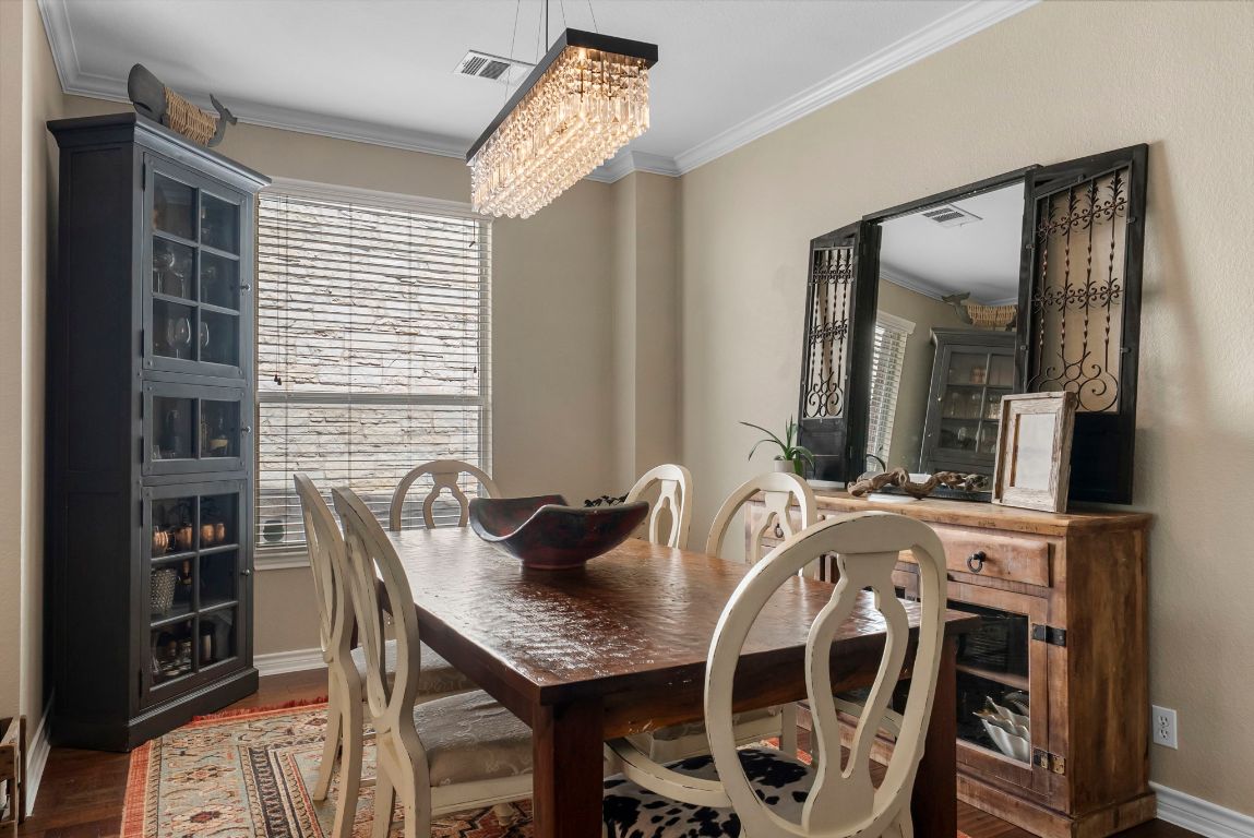 4104 Seldalia Trail Austin, TX 78732 - Photo 7 of 40 a view of a dining room with furniture and window