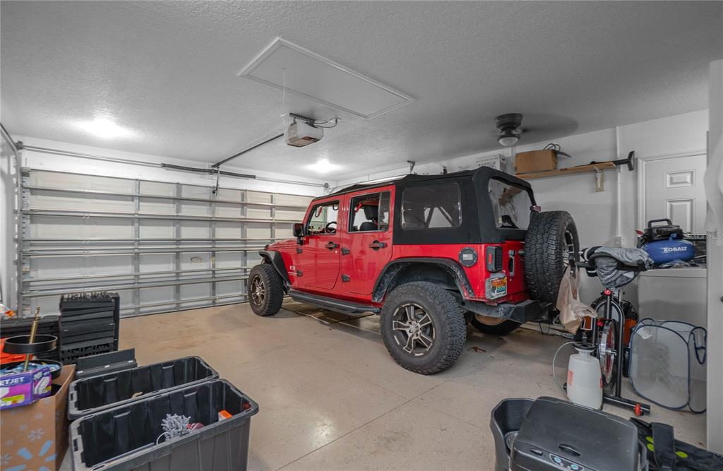 5466 West Tortuga Loop Lecanto, FL 34461 - Photo 41 of 41 a car is parked in a garage