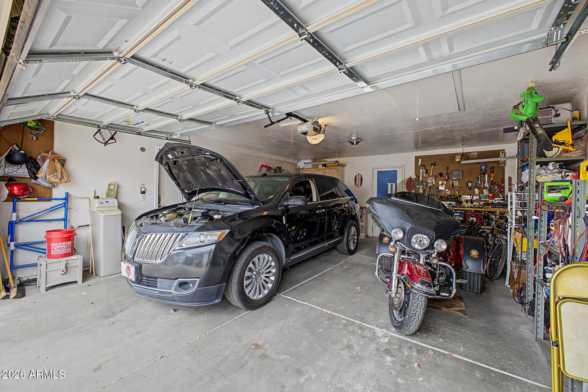 2101 South Meridian Road, Unit 45 Apache Junction, AZ 85120 - Photo 22 of 36 a view of parking garage with cars