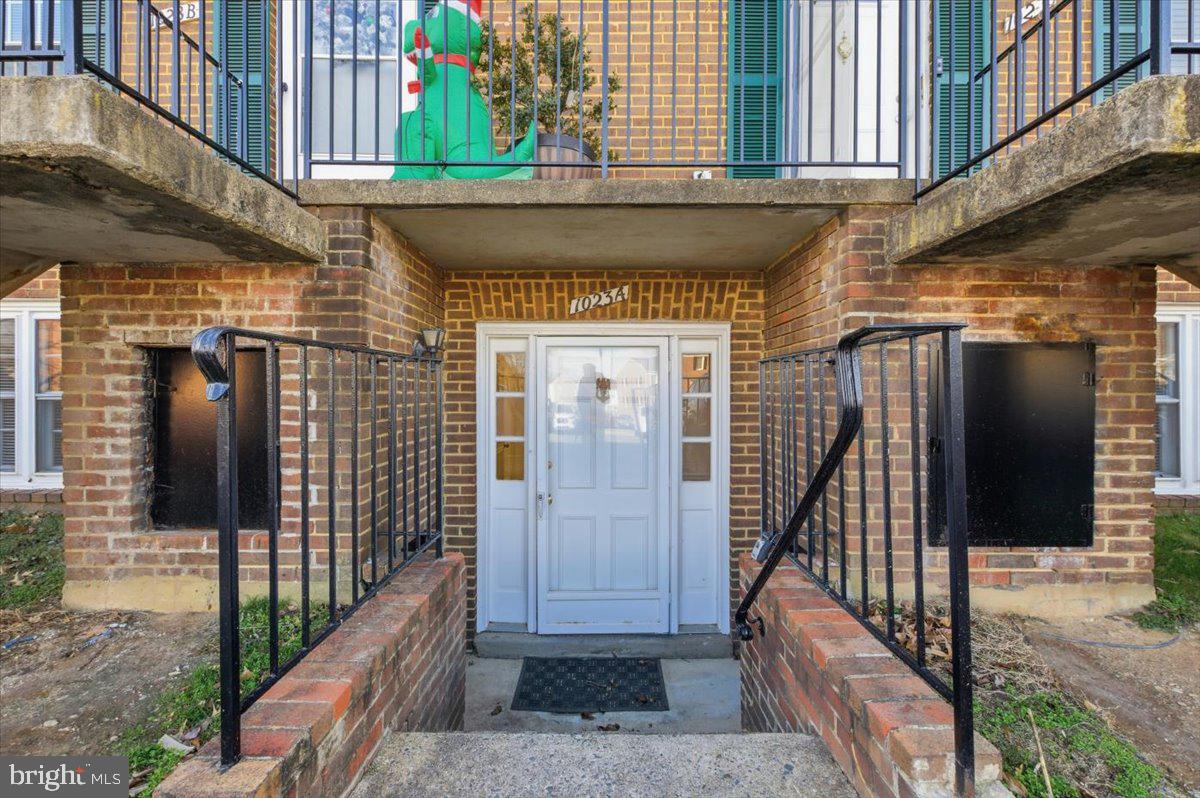 a view of entryway with a wooden door