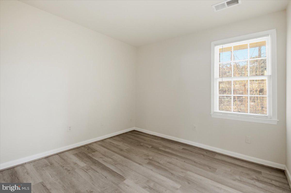 Margate Court, Unit A Sterling, VA 20164 - Photo 11 of 20 an empty room with a window