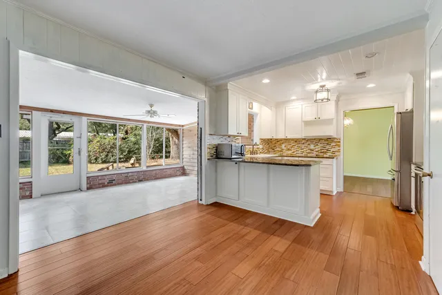 a house with trees in front of it