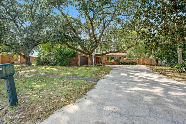 a view of hallway with wooden floor