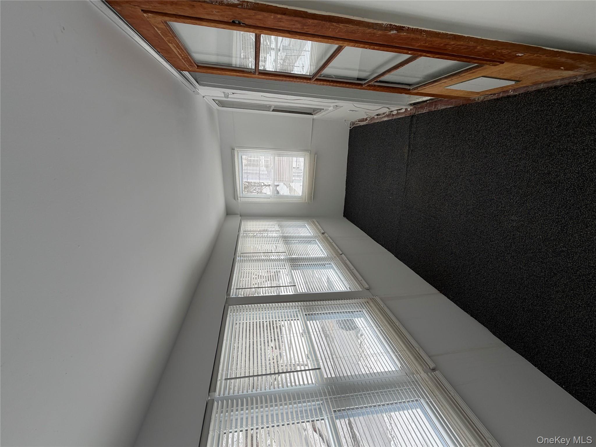 32 Fountain Place, Unit 2 Poughkeepsie, NY 12603 - Photo 9 of 20 a view of an empty room with a window