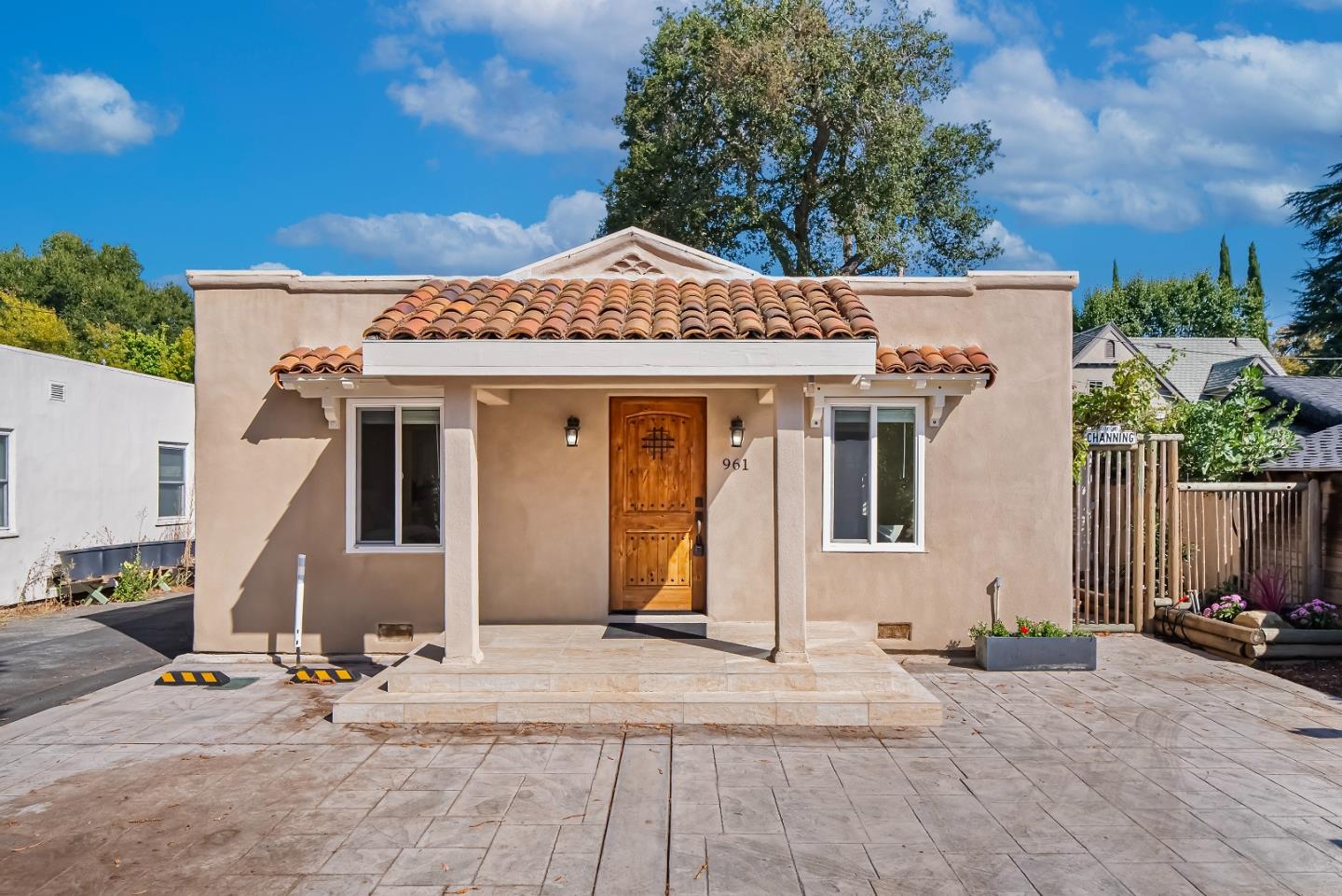 a front view of a house with patio