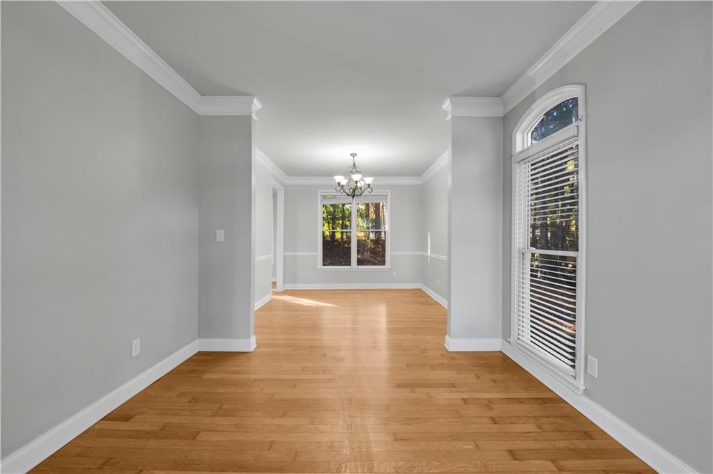 1427 Lost Bridge Road Southwest Marietta, GA 30008 - Photo 14 of 50 a view of an empty room with window and stairs