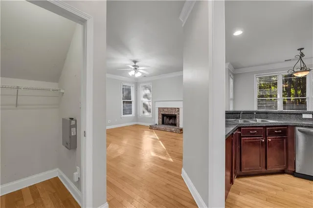 a view of a kitchen from the hallway
