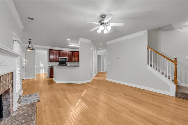 a view of a kitchen with a sink and a kitchen view