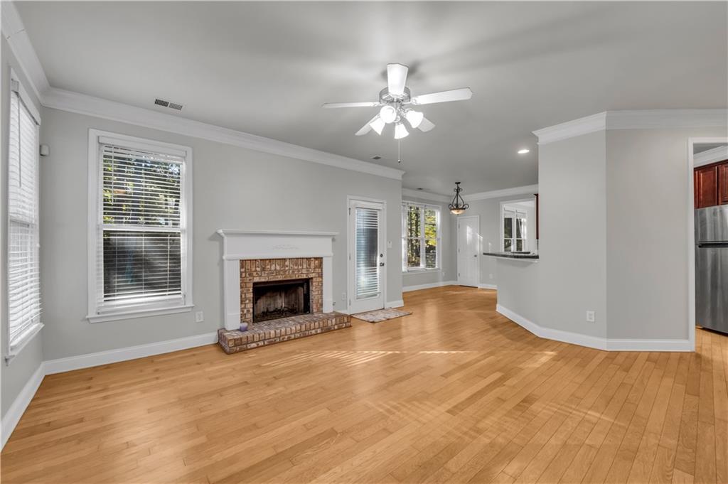 1427 Lost Bridge Road Southwest Marietta, GA 30008 - Photo 20 of 50 a view of an empty room with window and fireplace