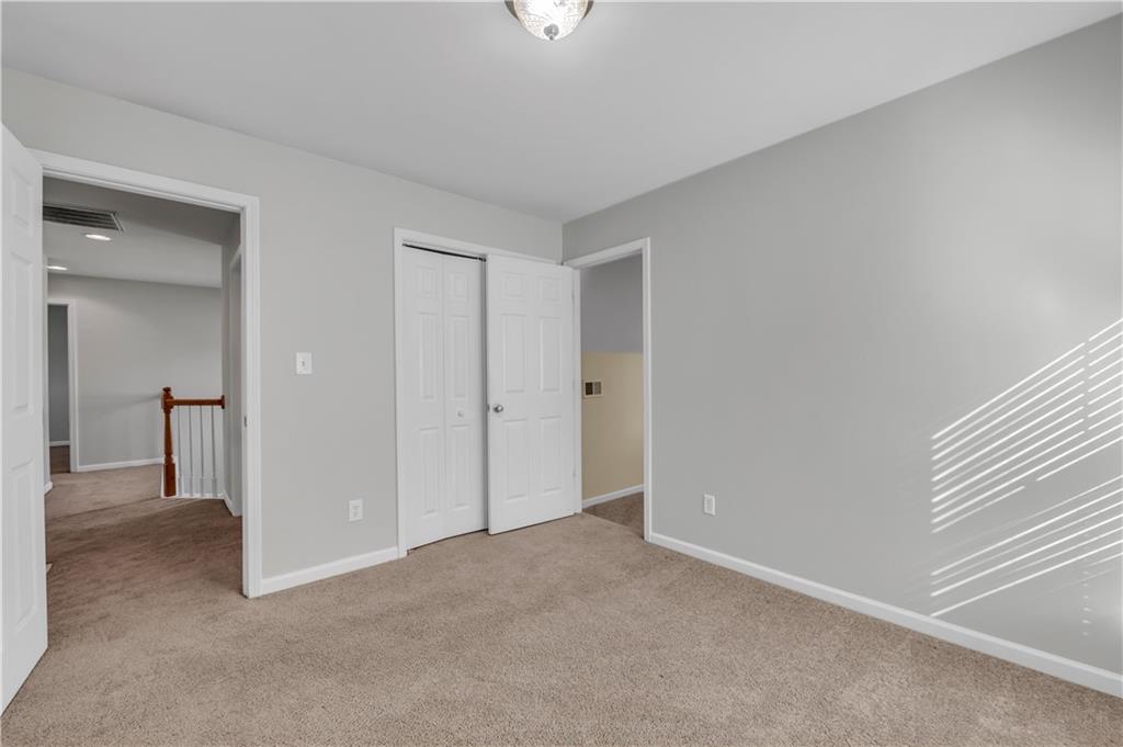 1427 Lost Bridge Road Southwest Marietta, GA 30008 - Photo 47 of 50 a view of an empty room with a window